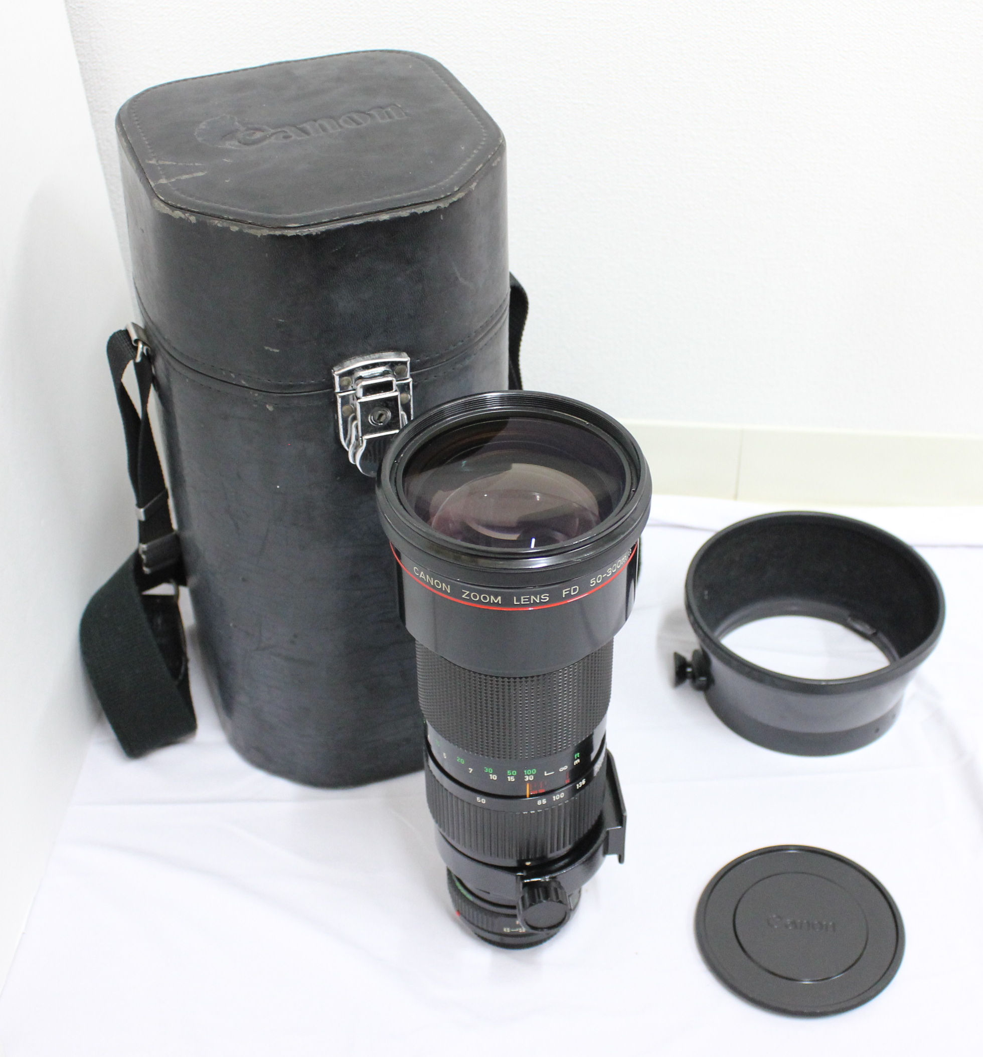 Japan Used Camera Shop | [Mint] Canon NEW FD 50-300mm F4.5 L Lens with Hood and Case from Japan