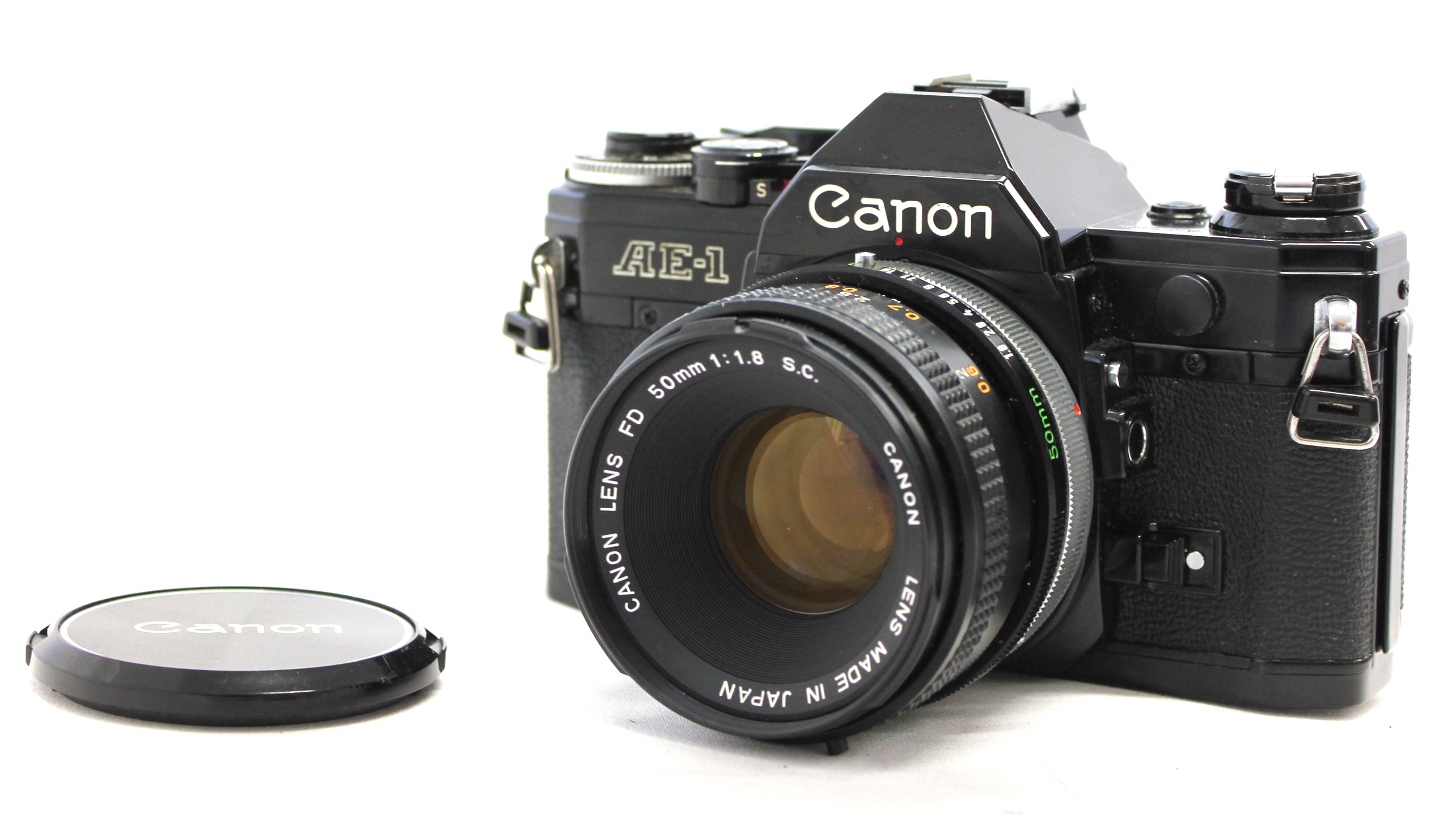 Japan Used Camera Shop | [Exc++++] Canon AE-1 35mm SLR Film Camera Black with FD 50mm F/1.8 S.C. Lens from Japan