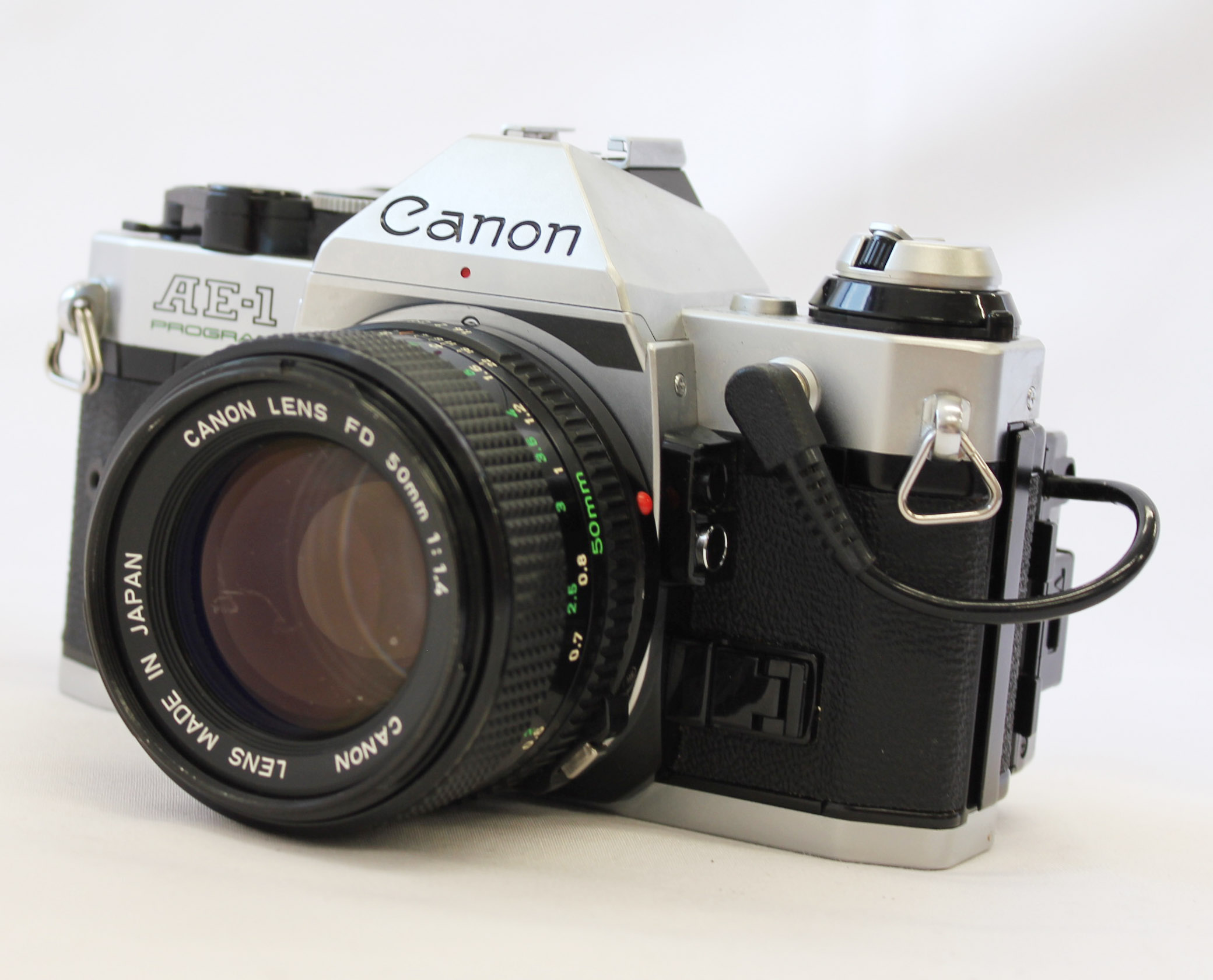 Canon AE-1 Program 35mm SLR Film Camera with New FD 50mm F/1.4 and