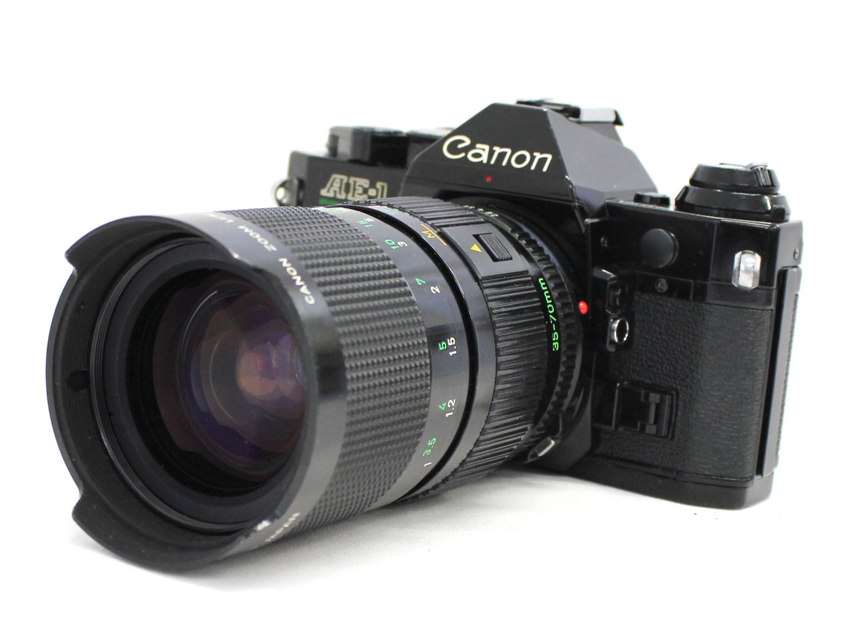 Canon AE-1 PROGRAM 35mm film camera w Canon Zoom FD 35-70mm A2 Power Winder 70-210mm f3.5 lenses Instructions and More