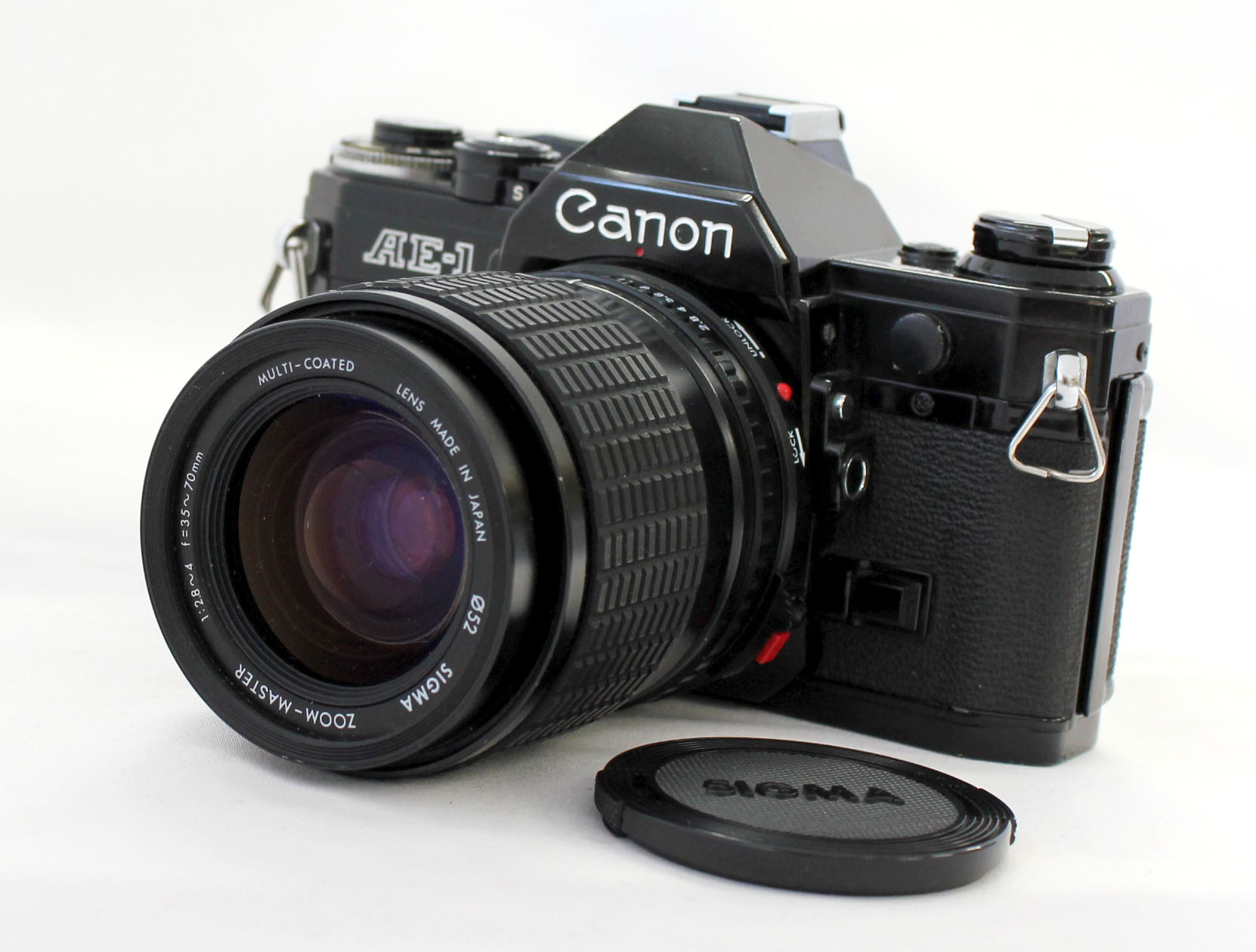 Japan Used Camera Shop | Canon AE-1 Black SLR Film Camera with Sigma Zoom-Master 35-70mm F2.8-4 Lens from Japan